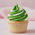 Cupcake met groen en witte toef